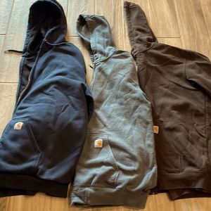 Carhartt hooded sweatshirts. Blue one is lined. All in great condition